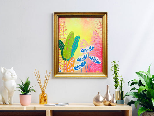Room with a dresser and 'Cosmic Jungle' painting on the wall above it. A vibrant and dreamy artwork featuring a captivating blend of neon colors and soft pastels, evoking a magical scene filled with positive energy and inspired by nature.